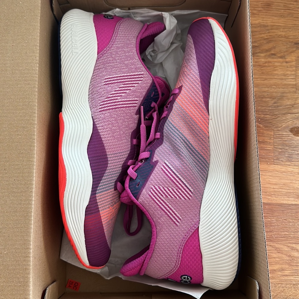 Women’s Size 11 Fuel Cell Shift TR sneakers. Never been worn.